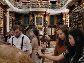 oxford students visiting pragues klementinum library hall